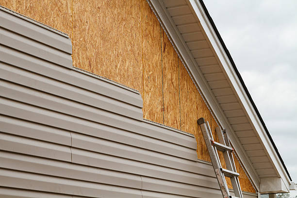 Professional Emergency Siding Repair technician working in Johnstown, CO